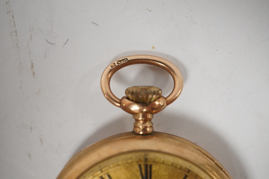 A George V 9ct gold open faced fob watch, with Roman dial and subsidiary seconds(hand loose), with 9ct gold cuvette, case diameter 34mm, gross weight 27.2 grams. Condition - poor to fair